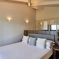 King Deluxe - Baia di Chia Resort, Curio Collection by Hilton