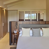 King Deluxe Lagoon View - Baia di Chia Resort, Curio Collection by Hilton