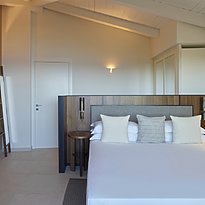 King Suite Sea View - Baia di Chia Resort, Curio Collection by Hilton